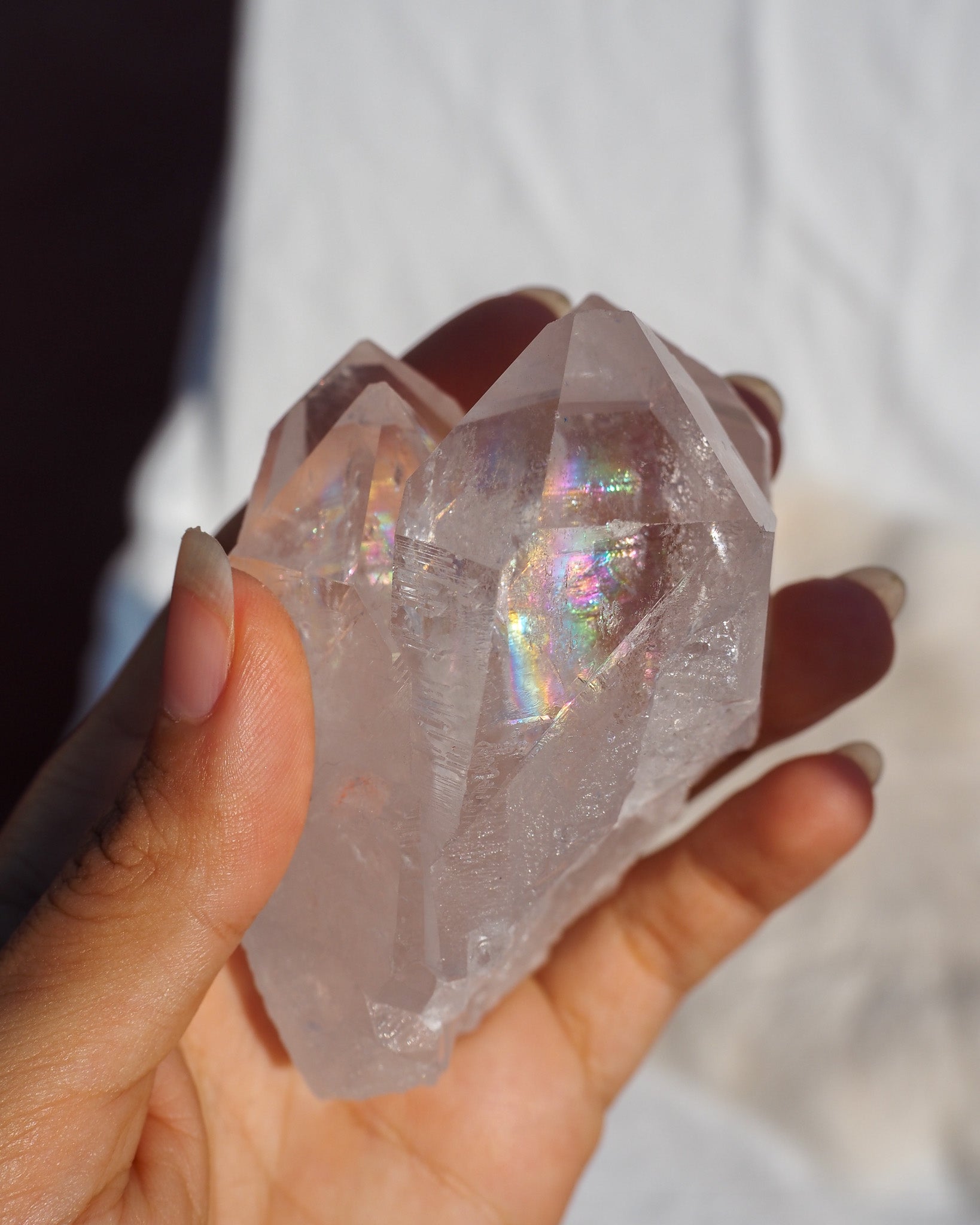 Rainbow Filled 4 Point Quartz Family